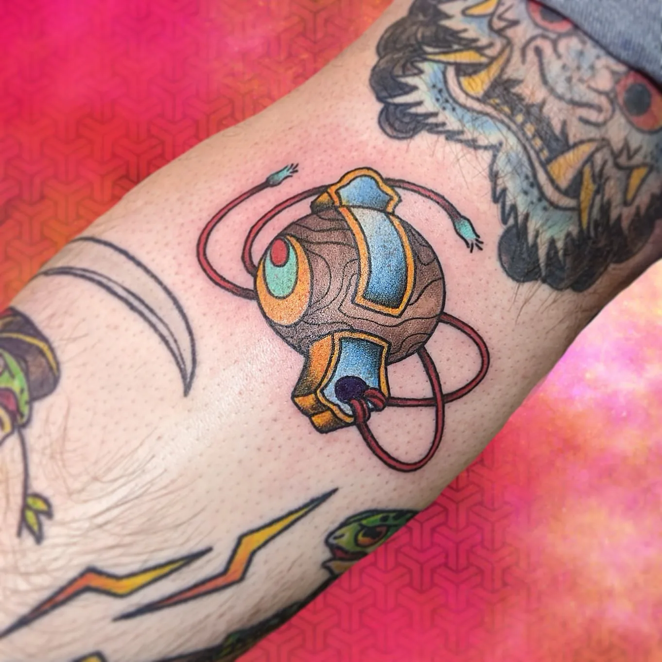 Color mechanical orb tattoo arm raleigh