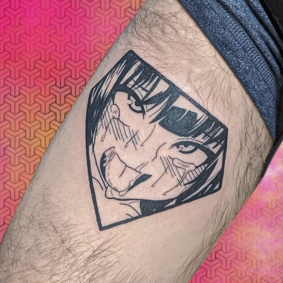 Diamond frame anime face tattoo bicep raleigh