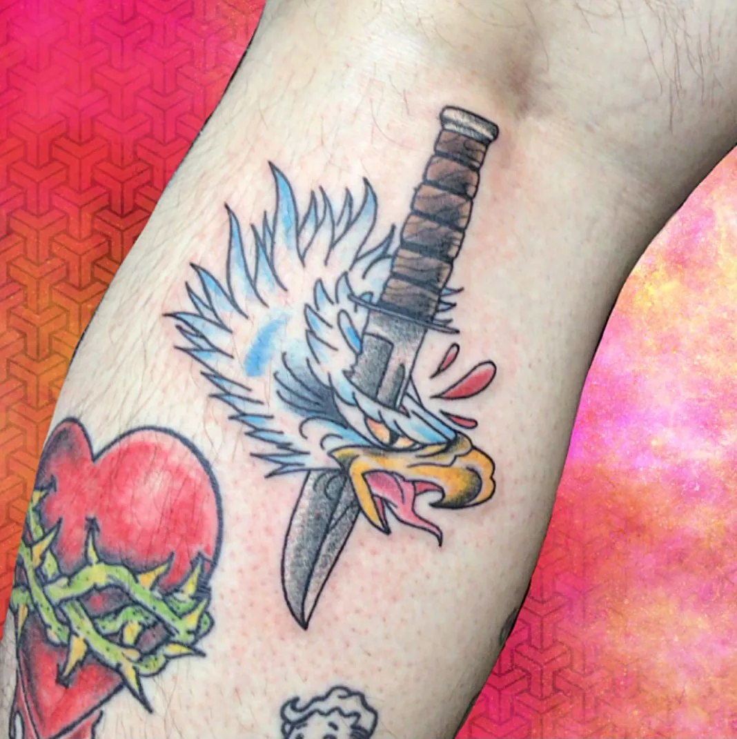 Eagle dagger tattoo inner bicep raleigh