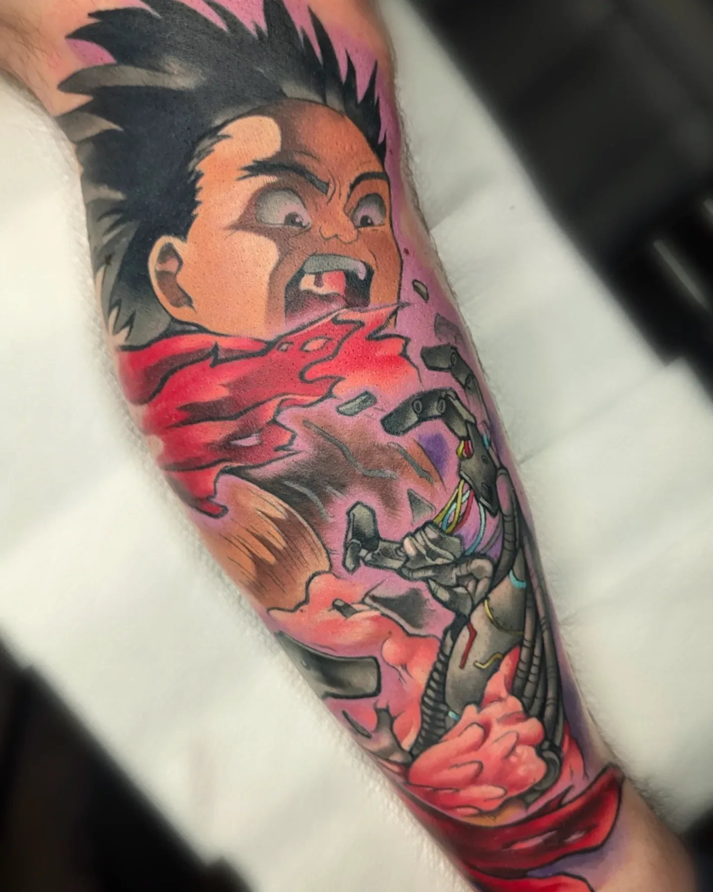 Anime character cyborg arm reveal forearm tattoo raleigh