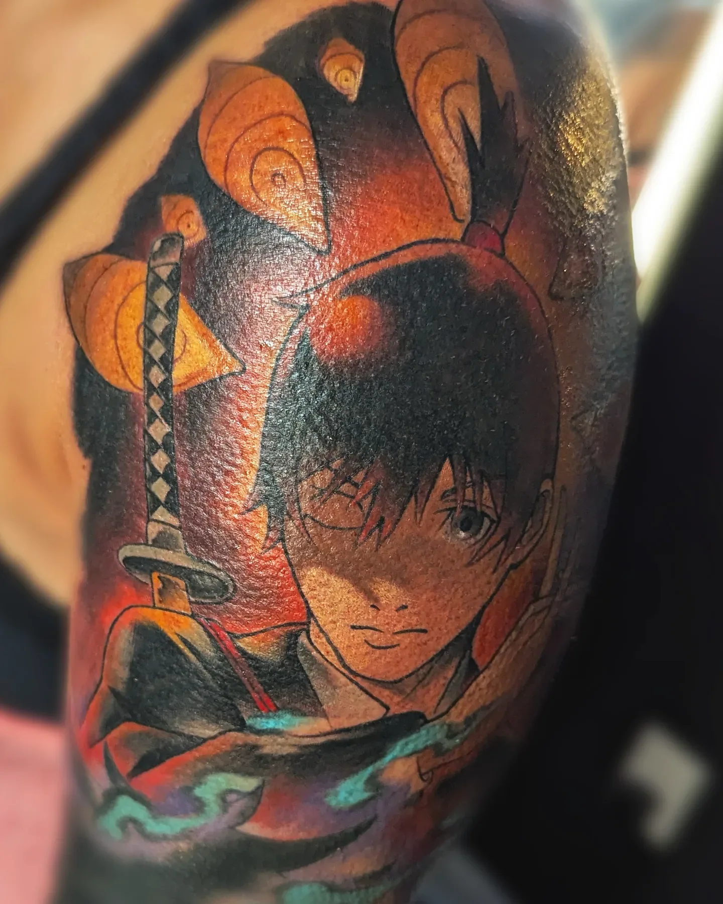 Anime character sword shoulder tattoo raleigh