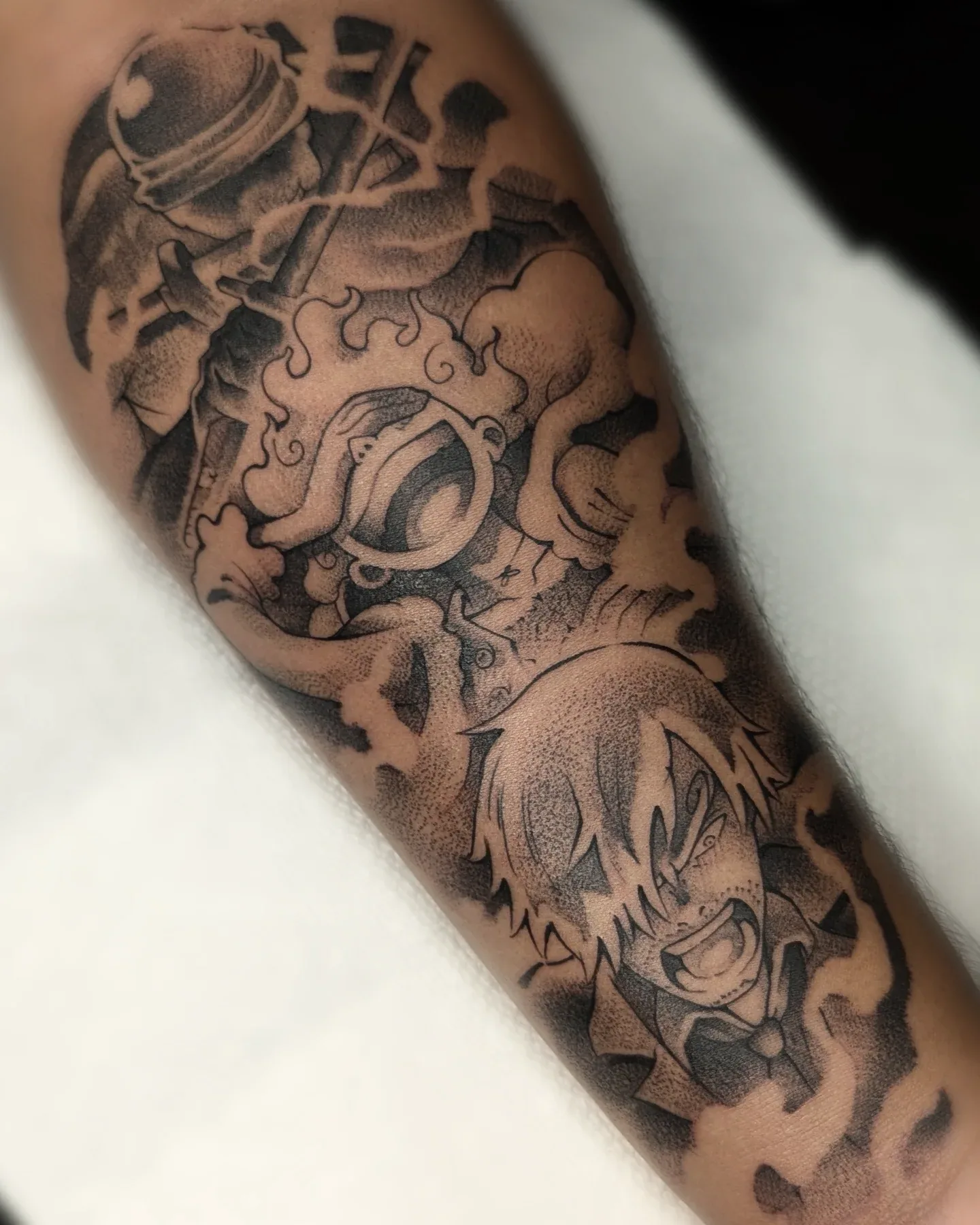 Anime warrior mask flame forearm tattoo raleigh