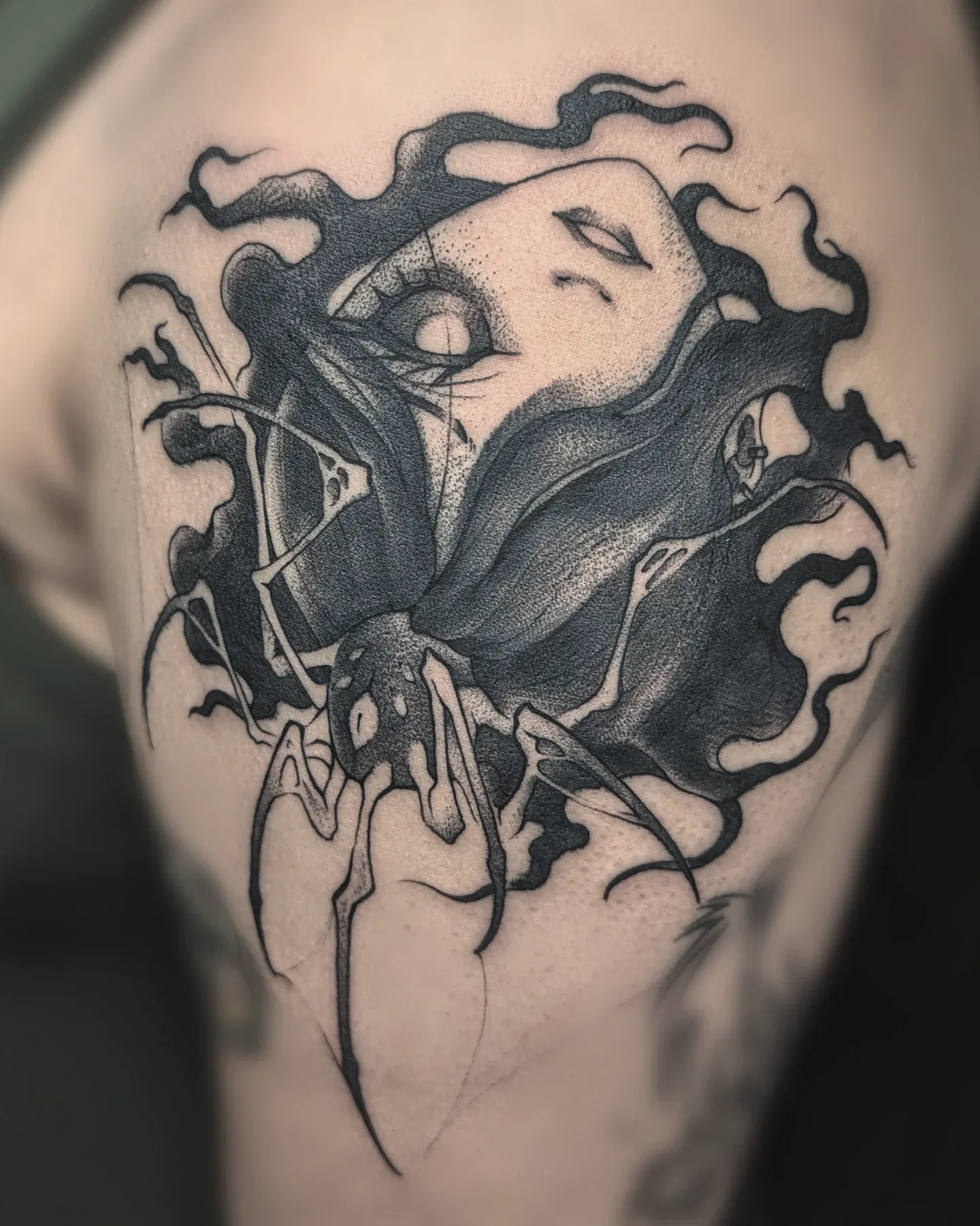 Black grey abstract face shoulder tattoo raleigh
