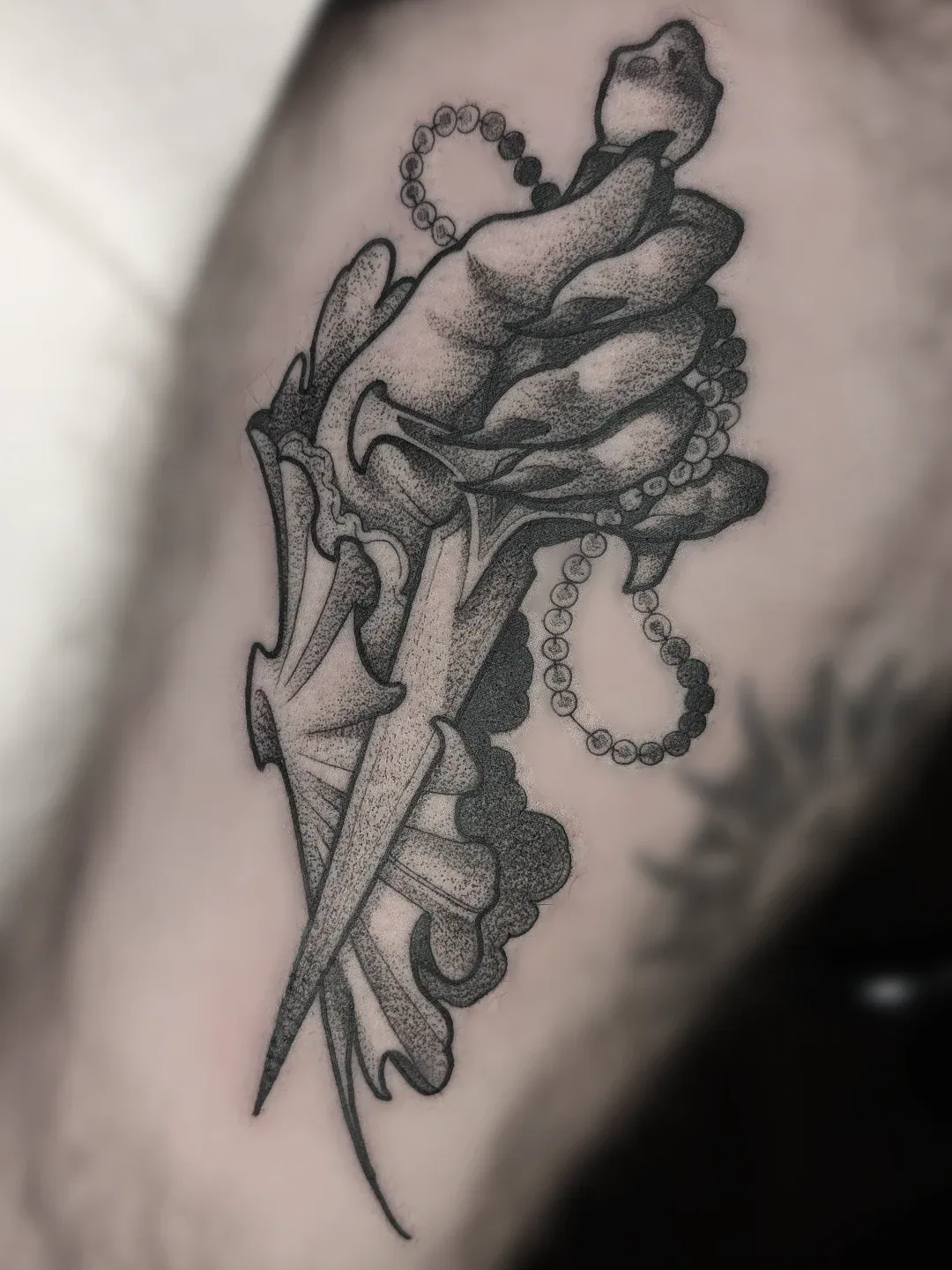 Black grey hand dagger rosary tattoo raleigh