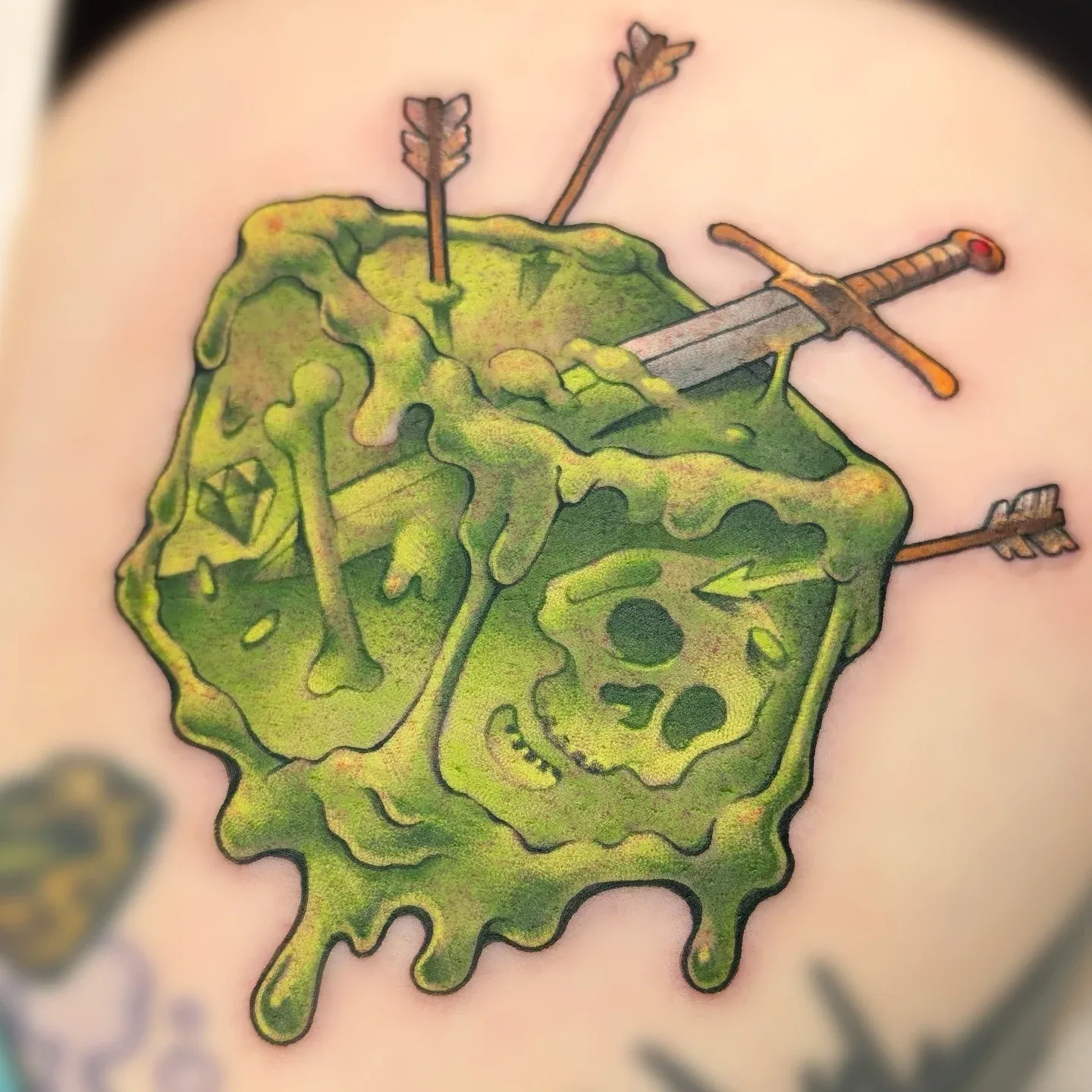 Green slime monster sword tattoo raleigh
