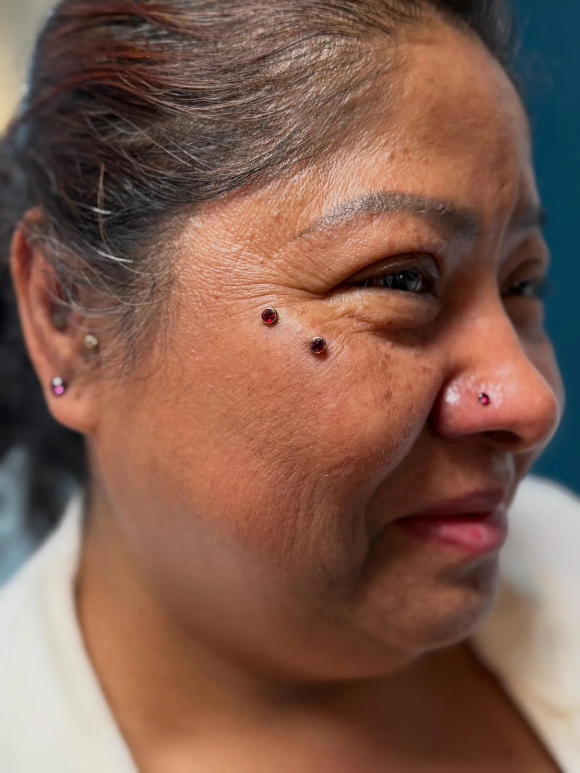 Dermal cheek piercings red jewelry raleigh