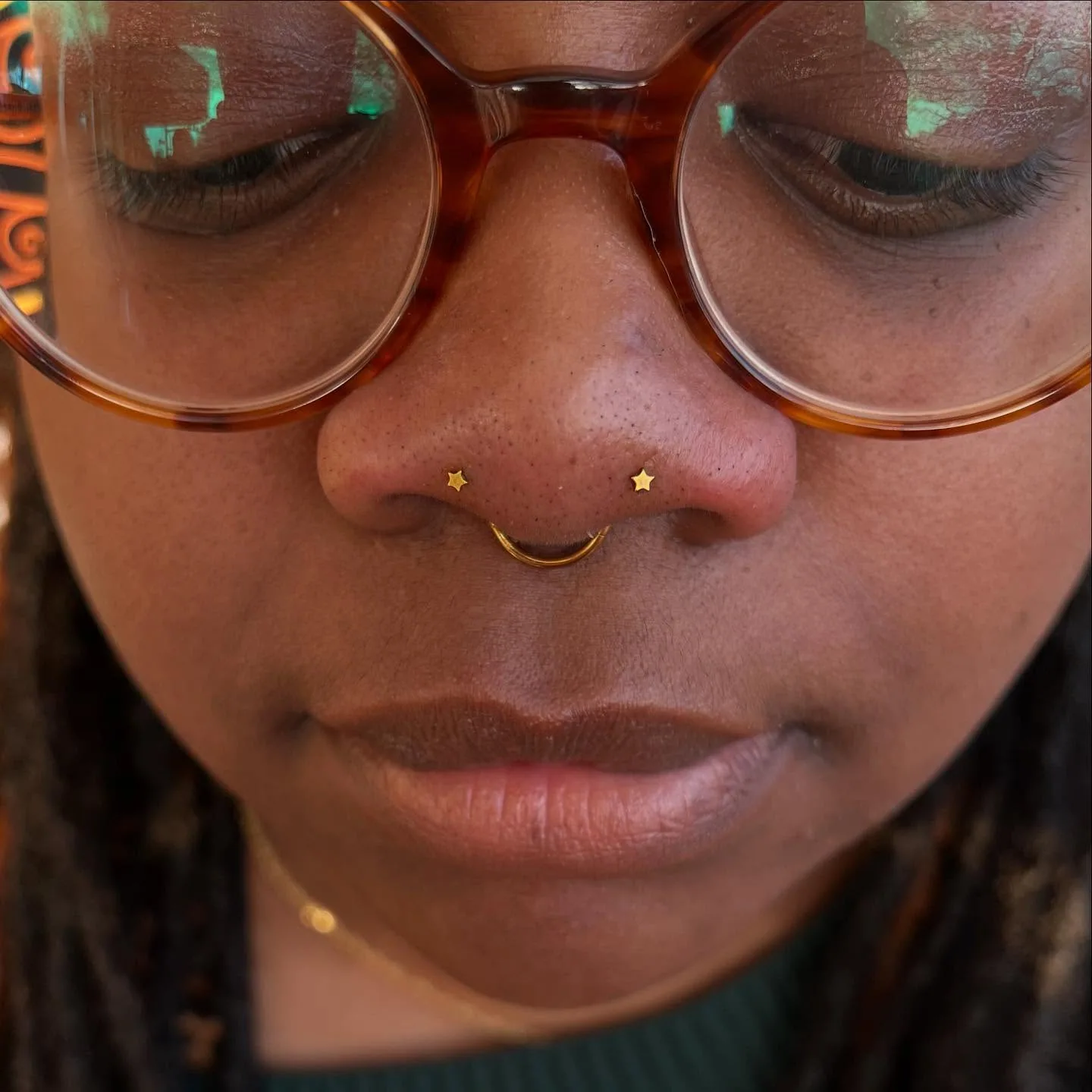 Star stud nostril septum piercings raleigh