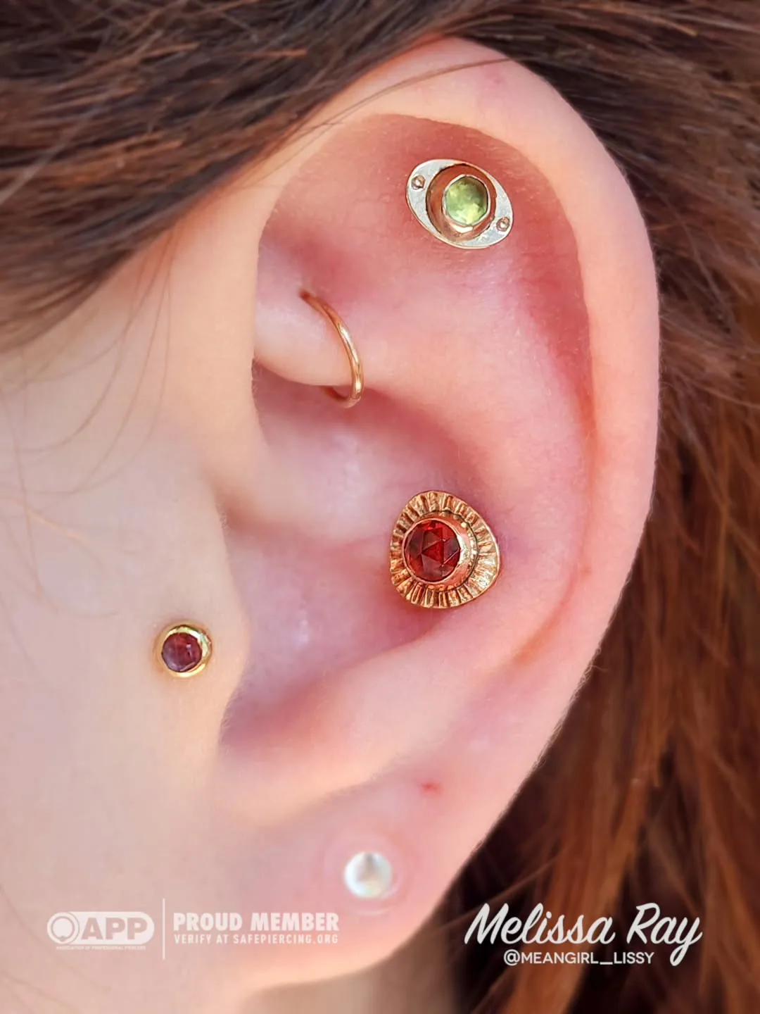 Garnet peridot ear piercing cluster raleigh